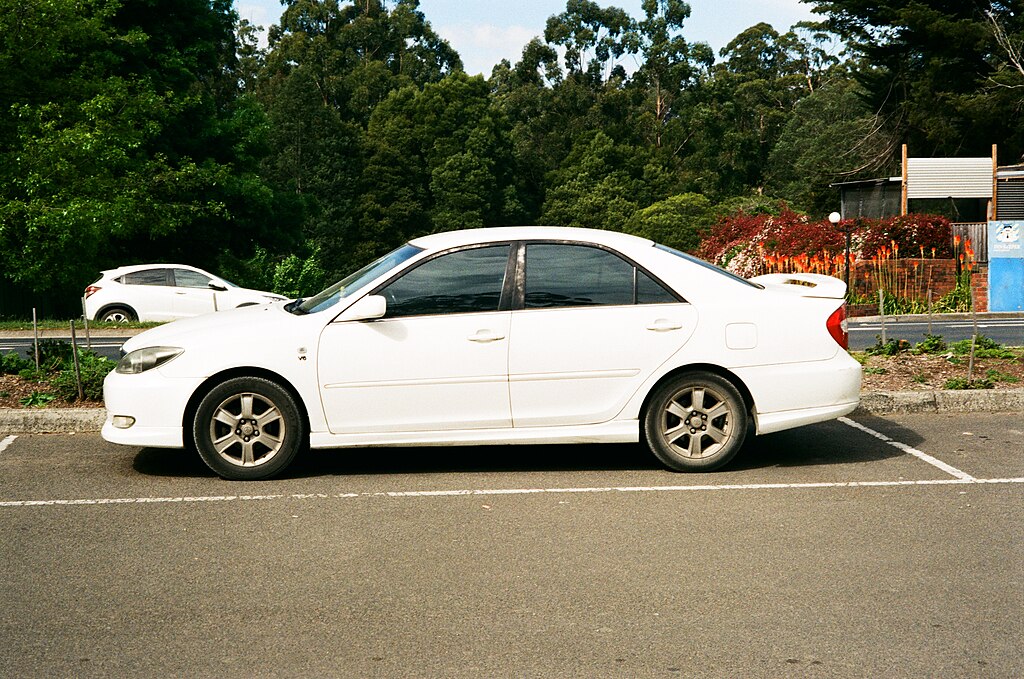 Close Up Photo of White 2003 Toyota Camry
