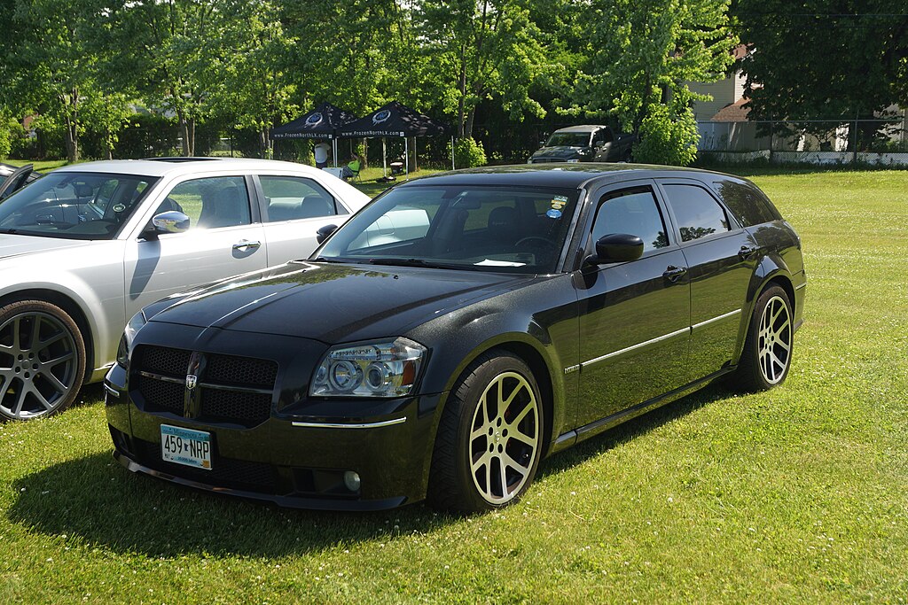 Close Up Photo of 2007 Dodge Magnum parked on a grass surface.