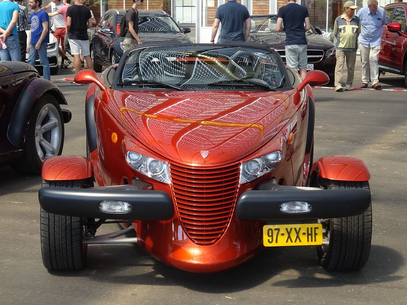 Close Up Photo of orange 2001 Plymouth Prowler.
