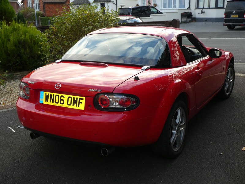 Close Up Photo of Red 2006 Mazda MX-5 Hardtop