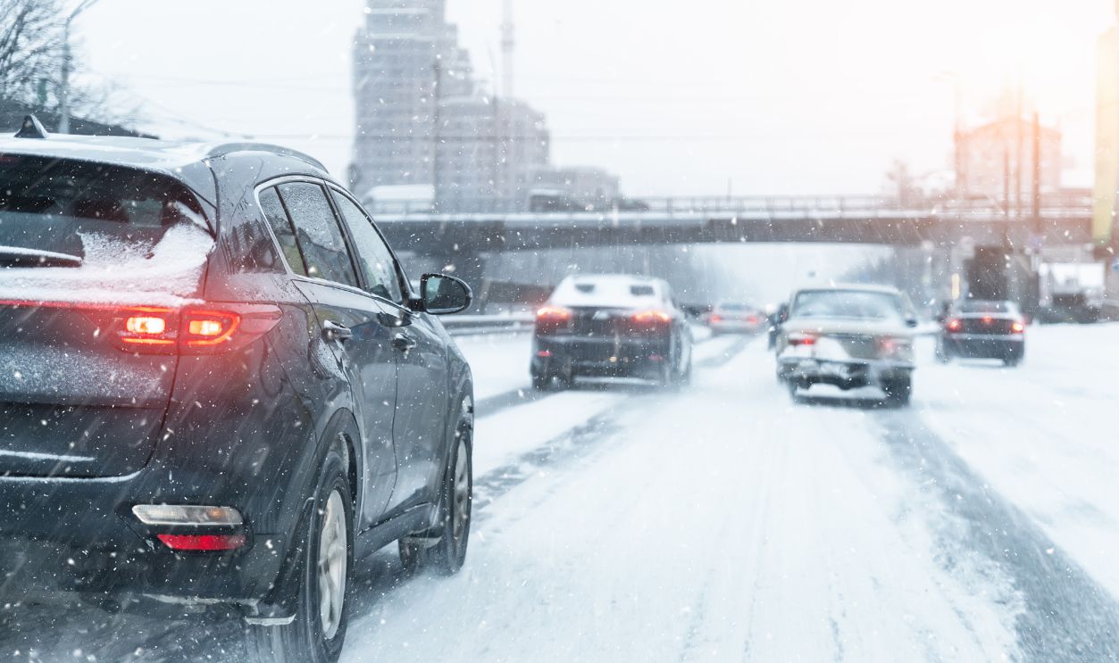 Driving car in snowy road