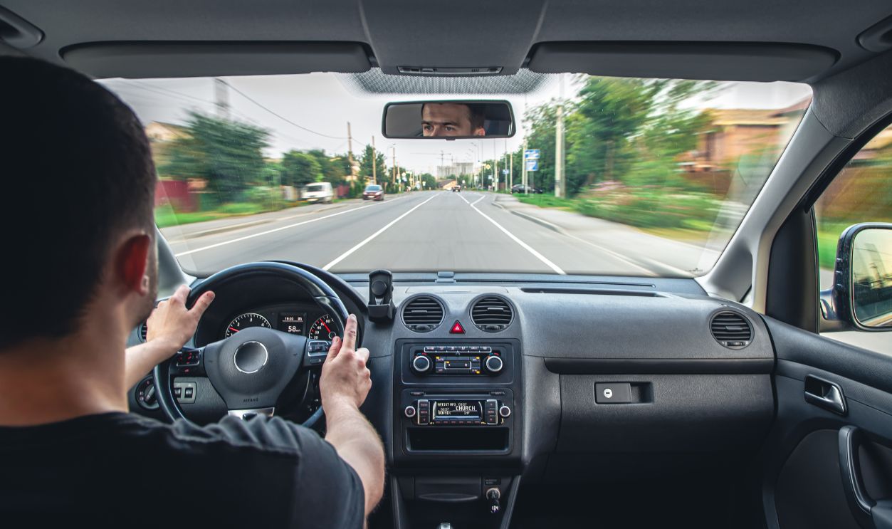 Hands on the wheel when driving at high speed from inside the car.