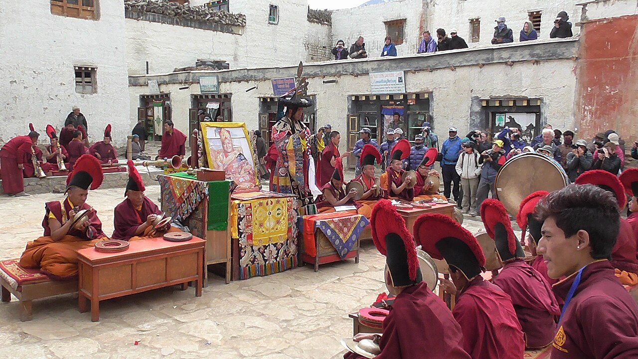 Monk performing worship  in Lo Manthang
