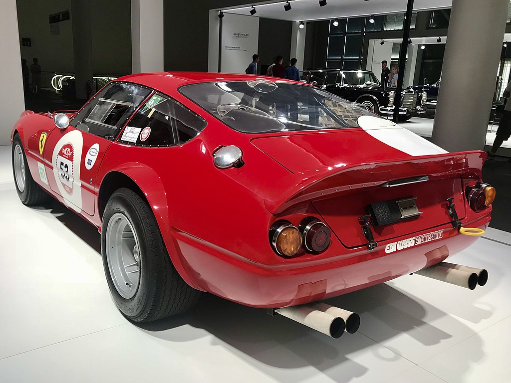 A close-up photo of a 1971 Ferrari 365 GTB 4 Daytona car on display at an exhibition
