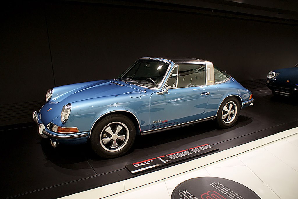 A close-up photo of a 1970 Porsche 911S car on display at an exhibition
