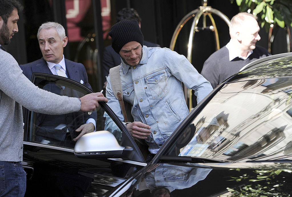 David Beckham getting in a car