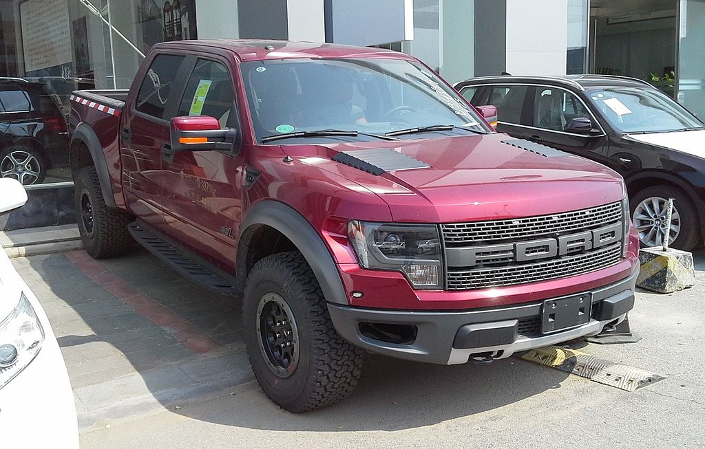 Cherry red colored Ford F-Series Xii