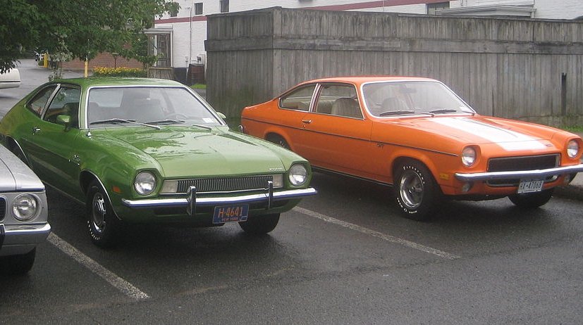Green Ford Pinto and Orange Chevrolet Vega