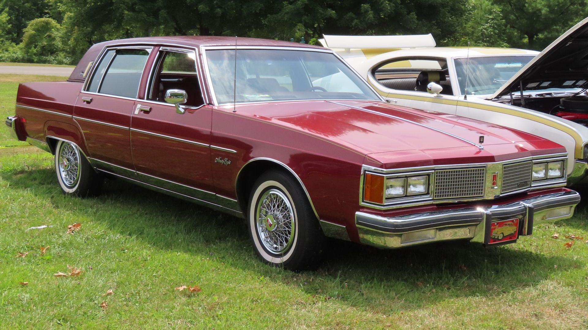 File:1984 Oldsmobile Ninety-Eight Regency sedan, front right, 07-21-2024.jpg