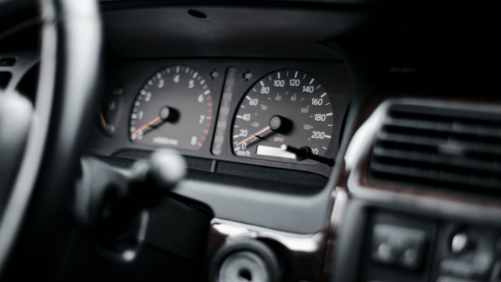 black and gray car instrument panel cluster