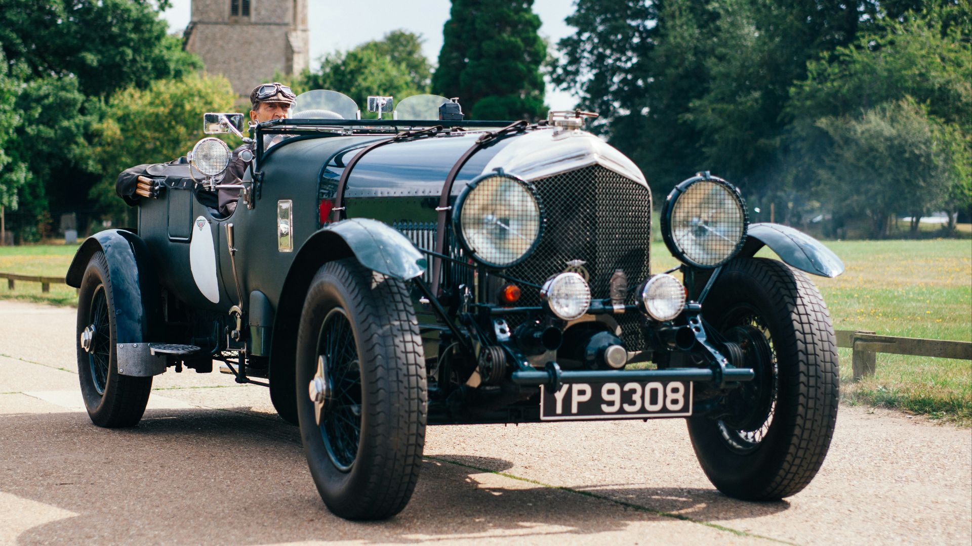 vintage roadster car on concrete road