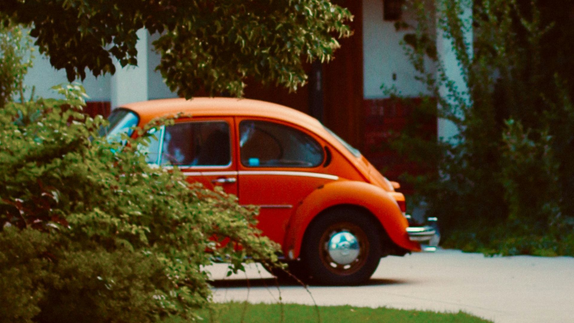 a car parked in front of a house