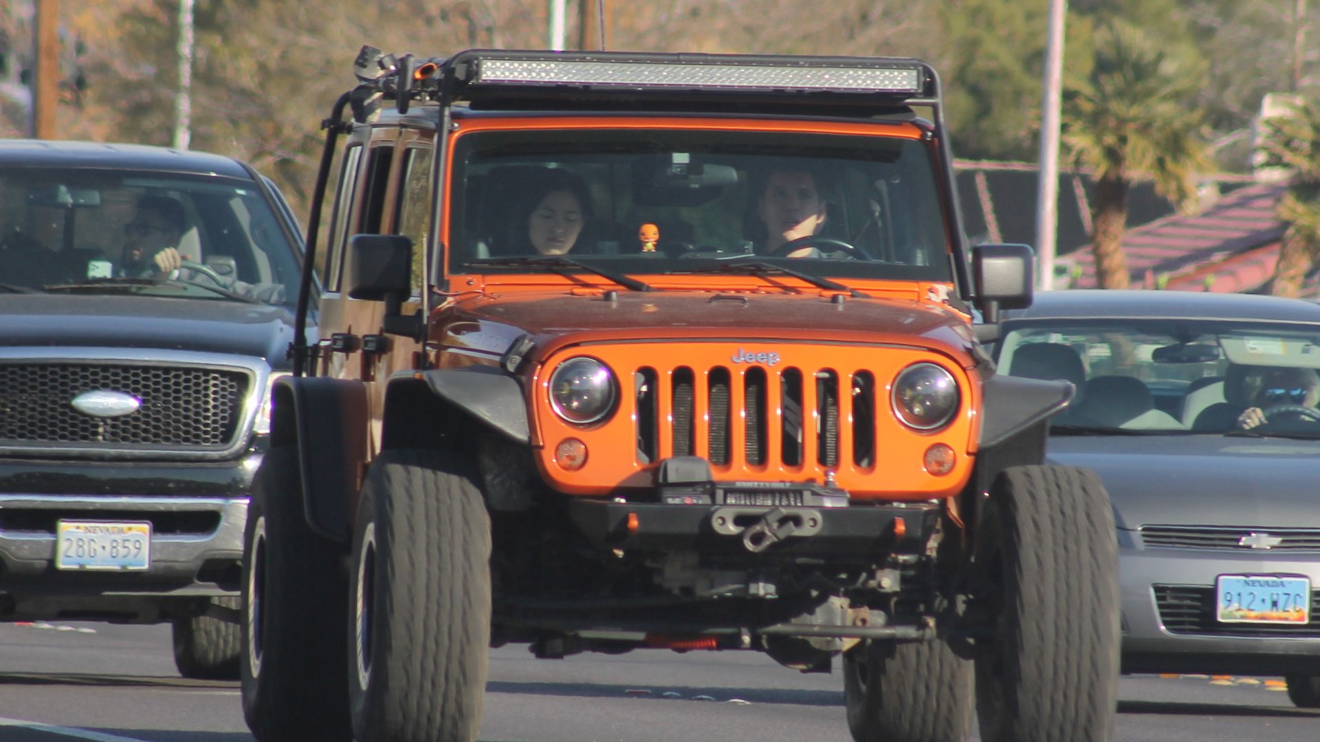 File:Customized Orange Jeep Wrangler JK on w Lone Mt Rd.jpg