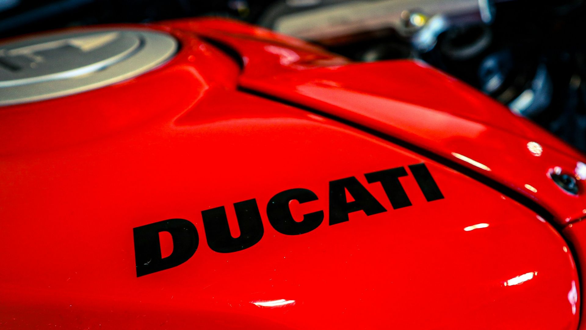 a close up of a red motorcycle engine