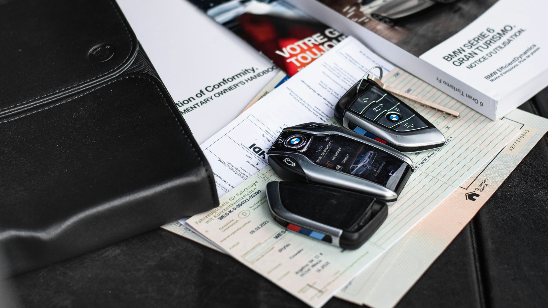 a couple of cell phones on a table