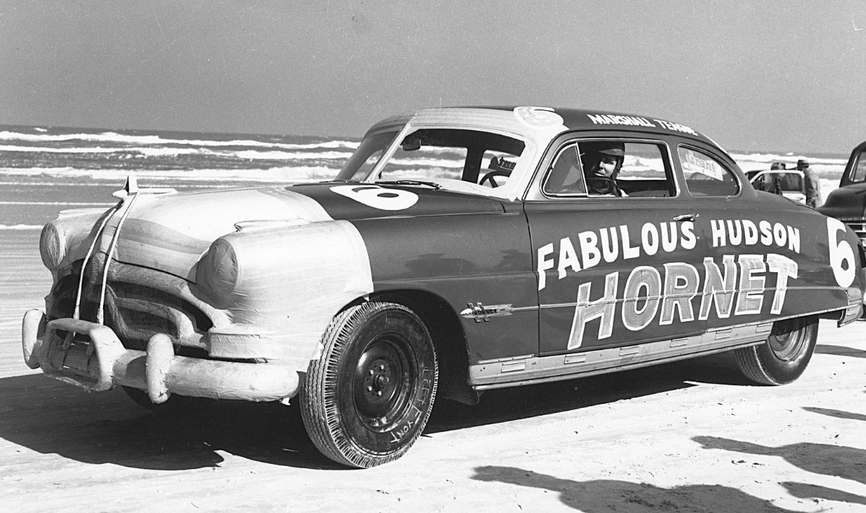 FEBRUARY 11, 1951: Marshall Teague won the Cup Series race on Daytona Beach in 1951 in his Hudson Hornet. The attention his victory brought caught the attention of the Hudson factory, and a few weeks later, Teague became backed by the manufacturer.