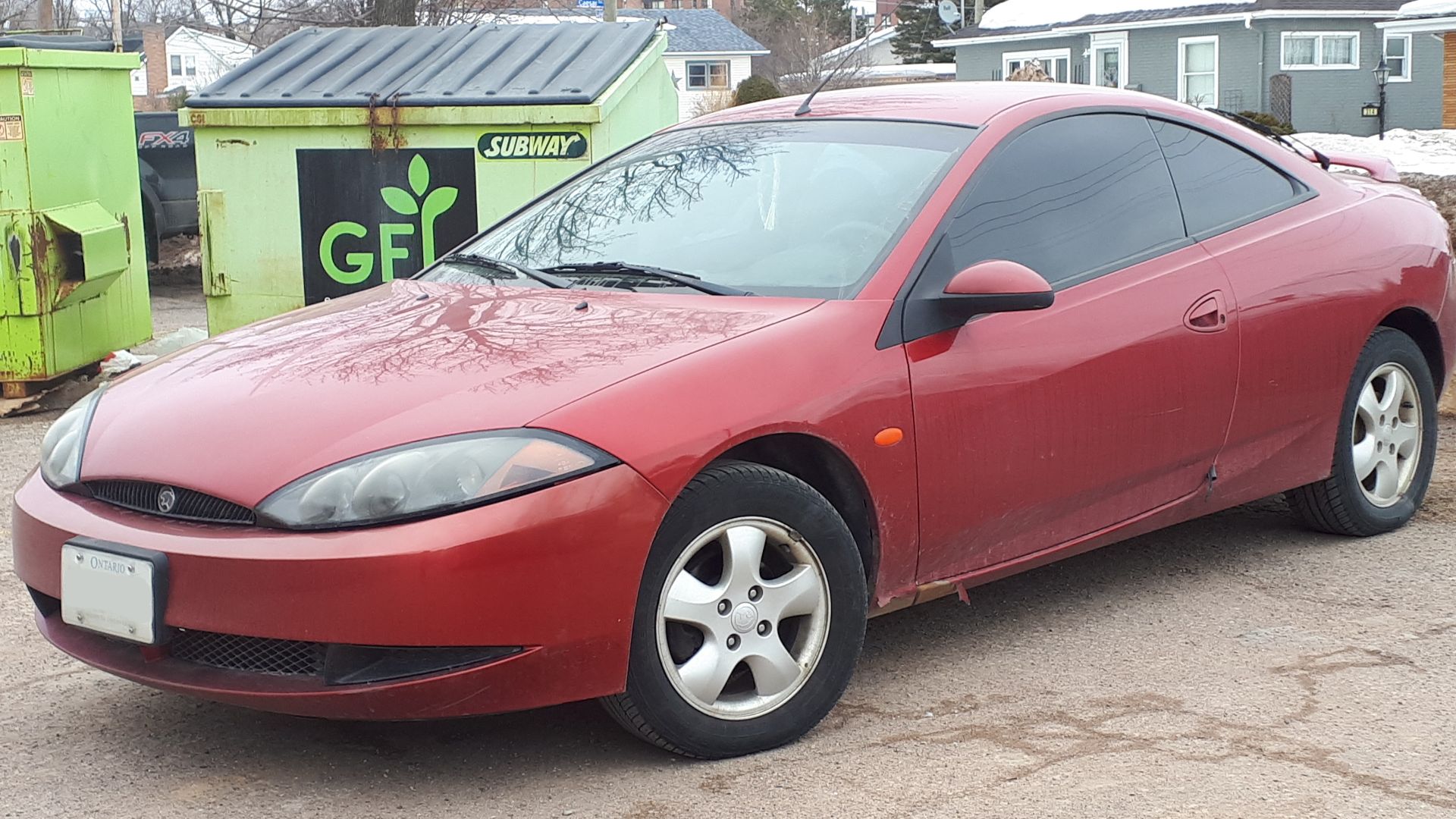 File:2000 Mercury Cougar V6 in Laser Red Metallic, Front Left, 03-27-2019.jpg