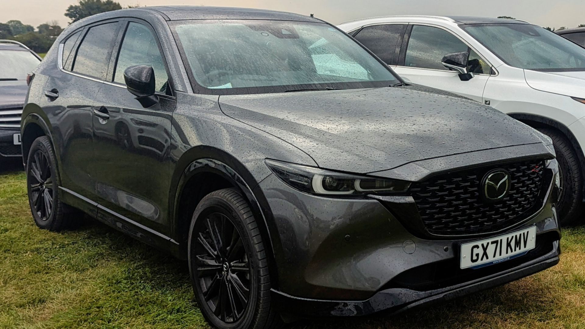 File:2021 Mazda CX-5 Sport Black Auto.jpg