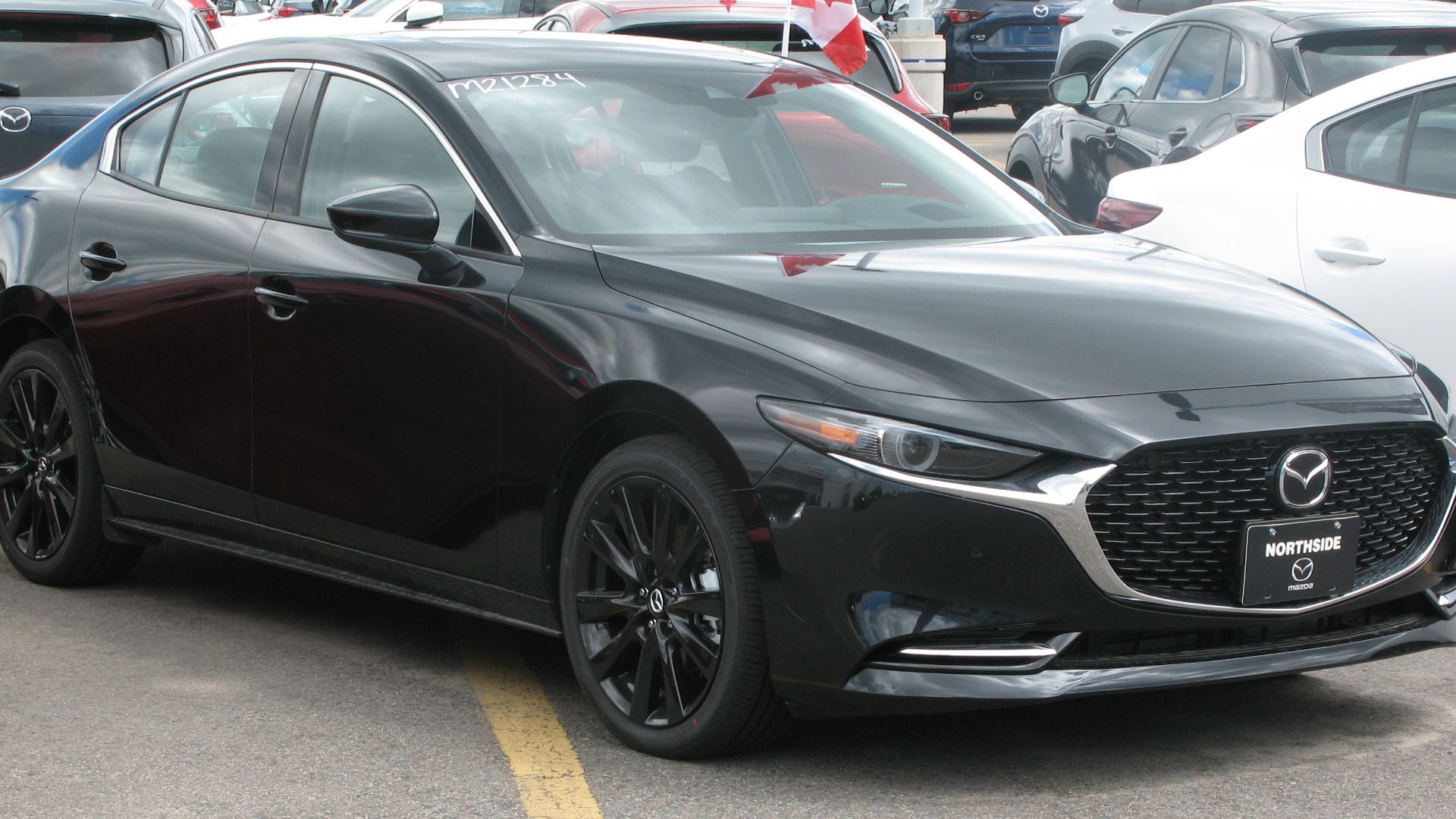 File:2021 Mazda3 GT Turbo AWD, Front Right, 07-01-2021.jpg