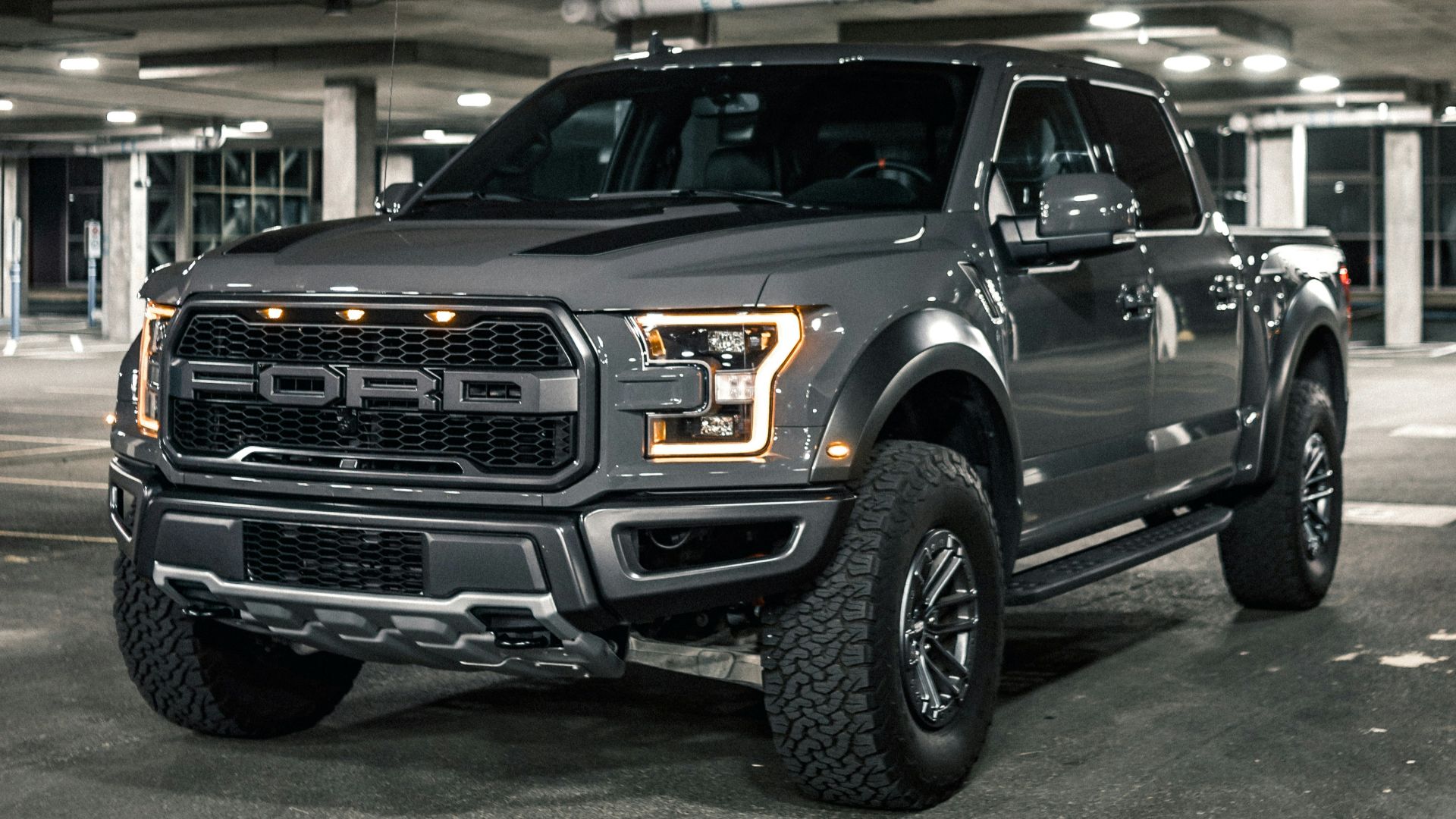 black suv in a garage