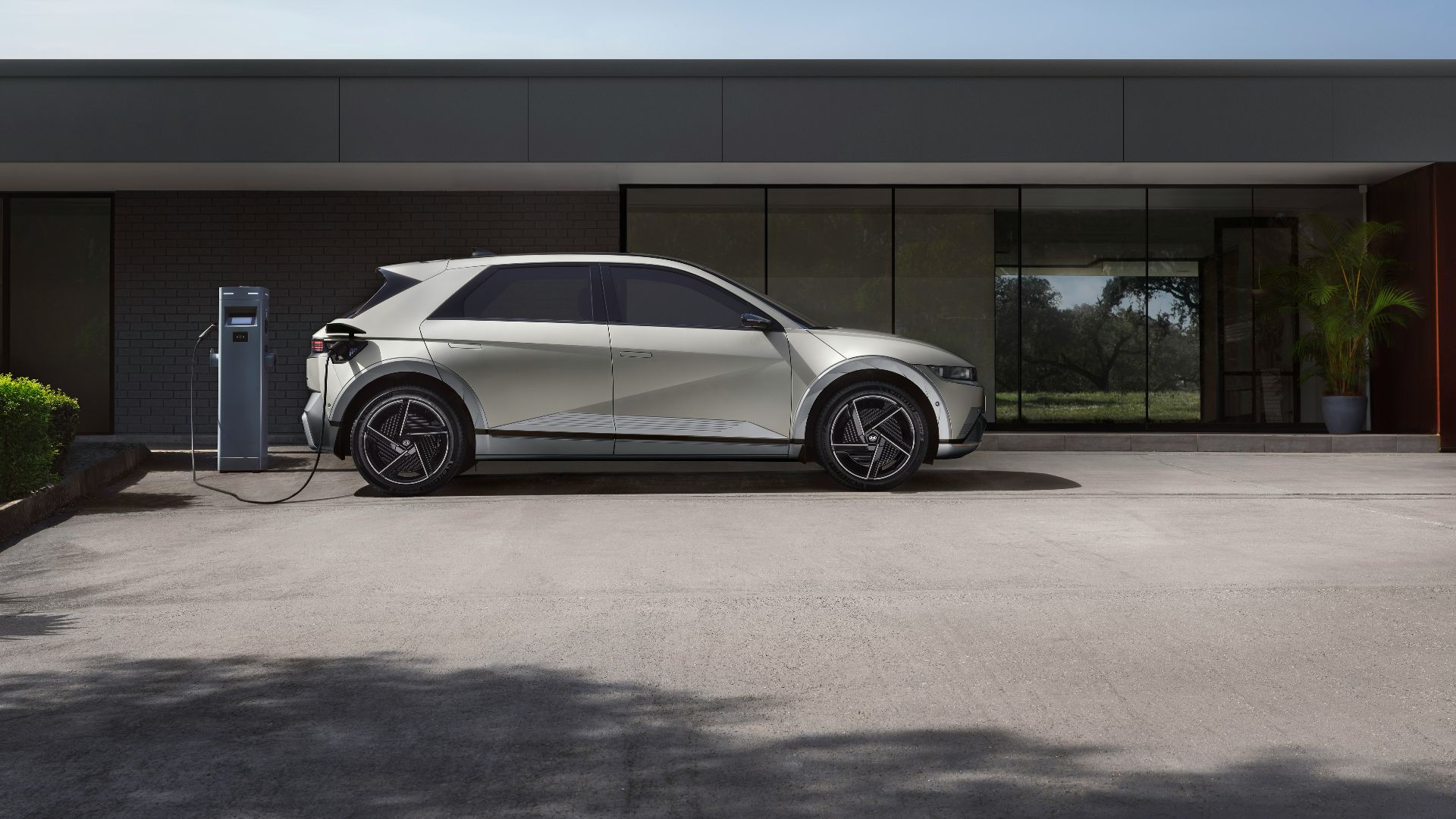 a white car parked in front of a building