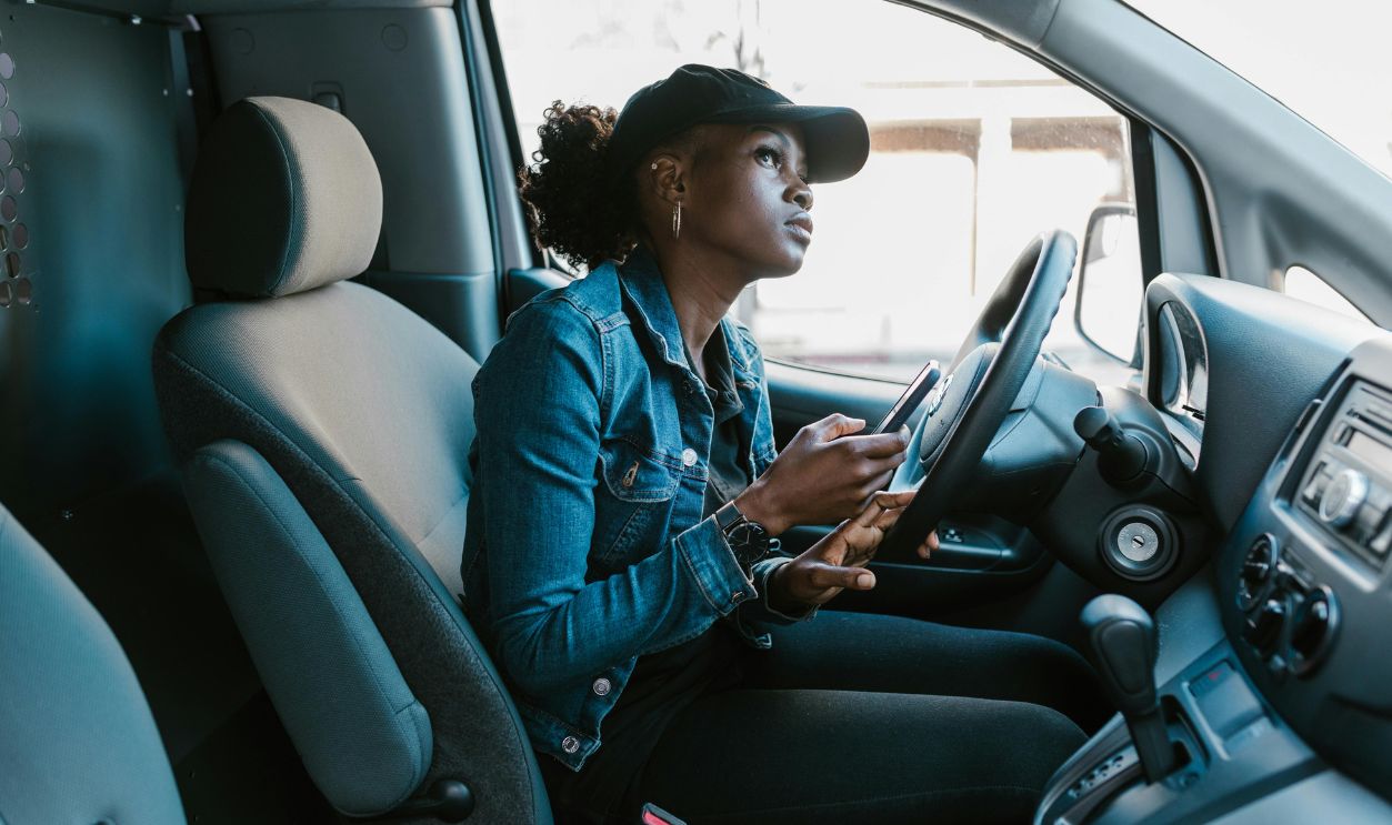 Woman looking up while driving