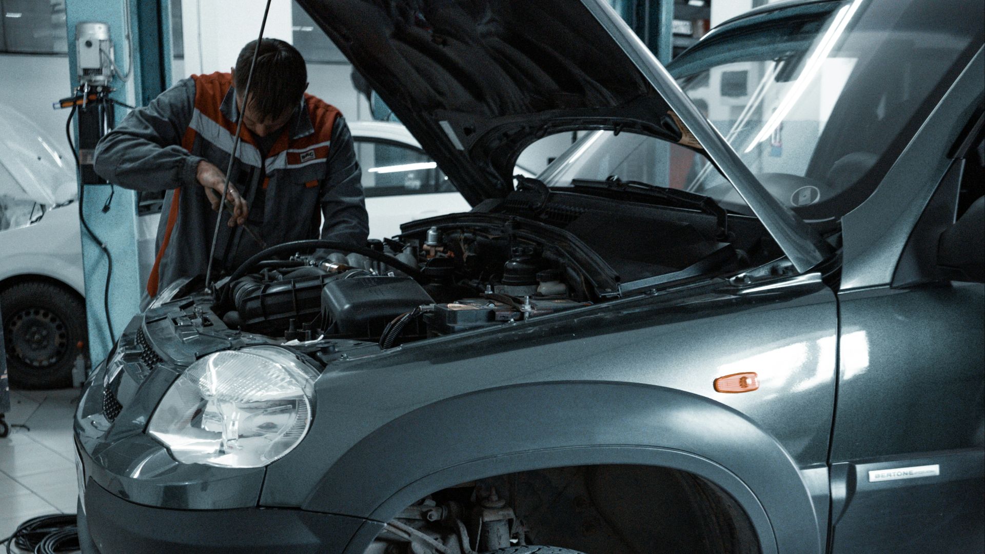 black suv in a garage