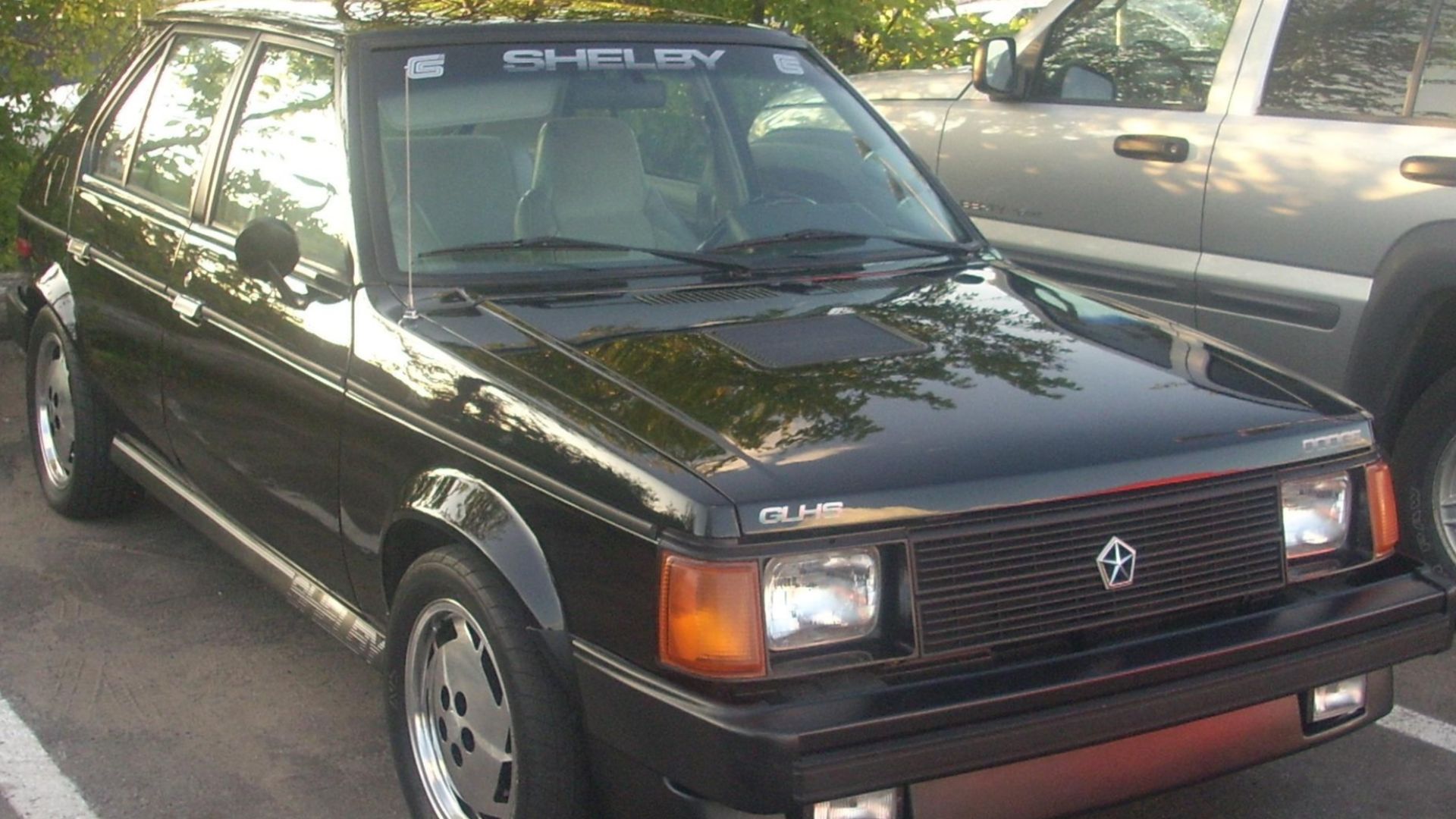 File:'86 Shelby GLHS (Orange Julep '09).jpg