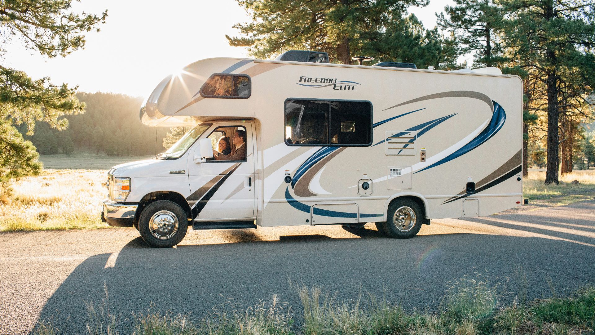 white and brown van on road during daytime
