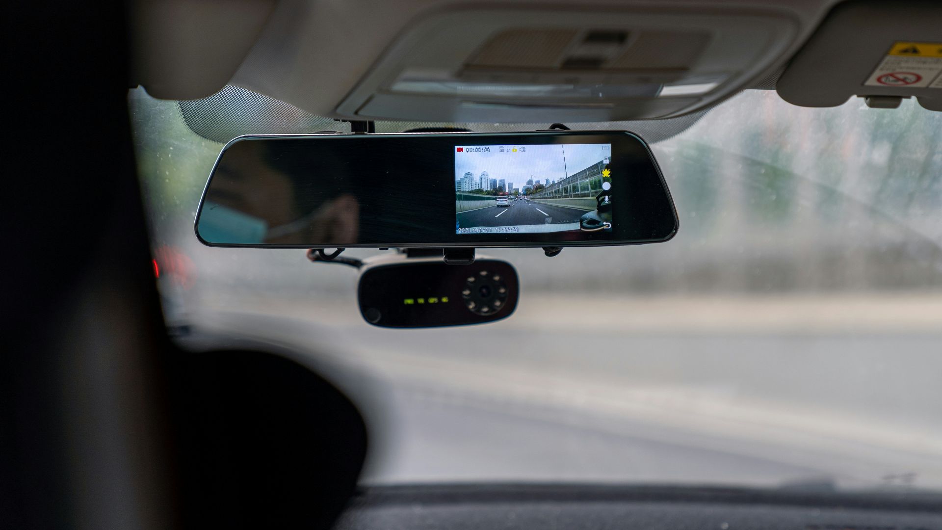 car side mirror with water droplets