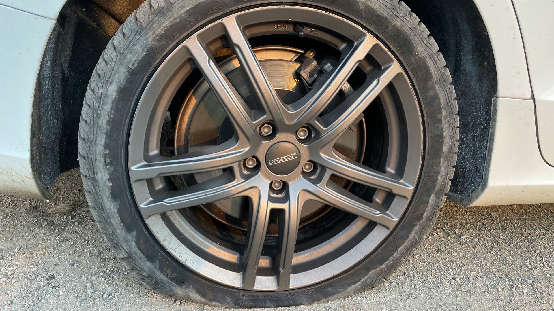 a close up of a tire on a car