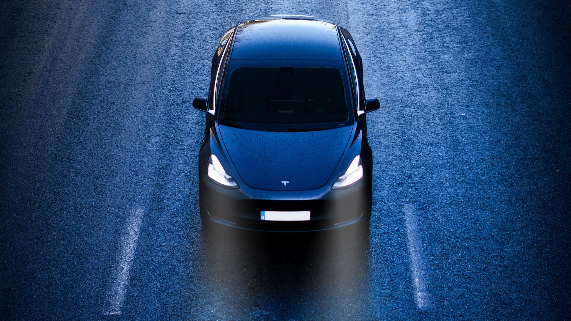 blue car on road during daytime