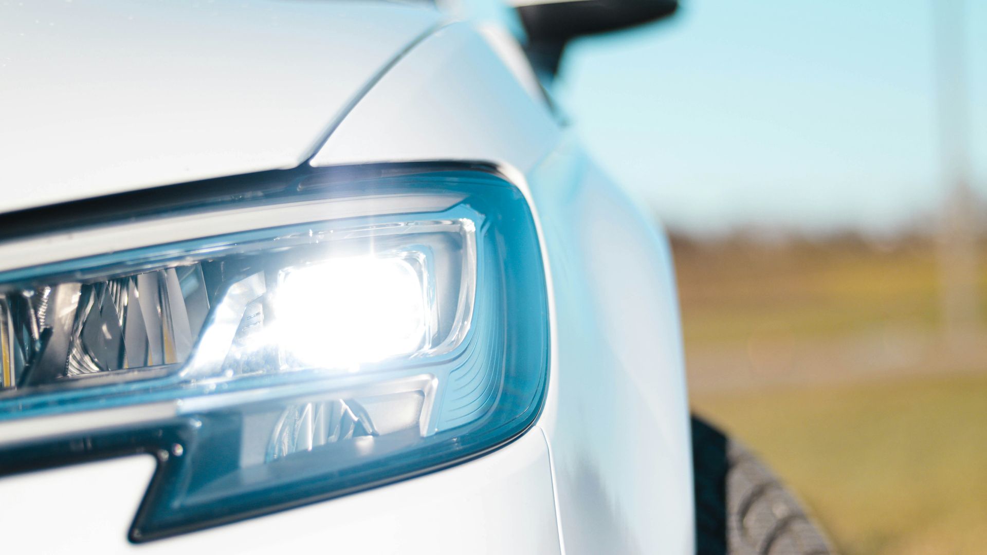 white car with blue light