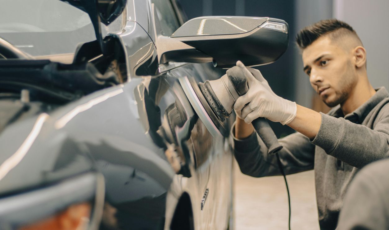 Man polishing car