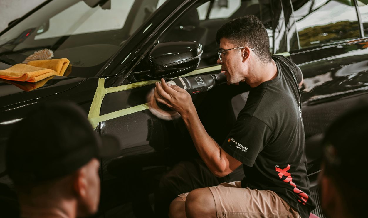 Man polishing car