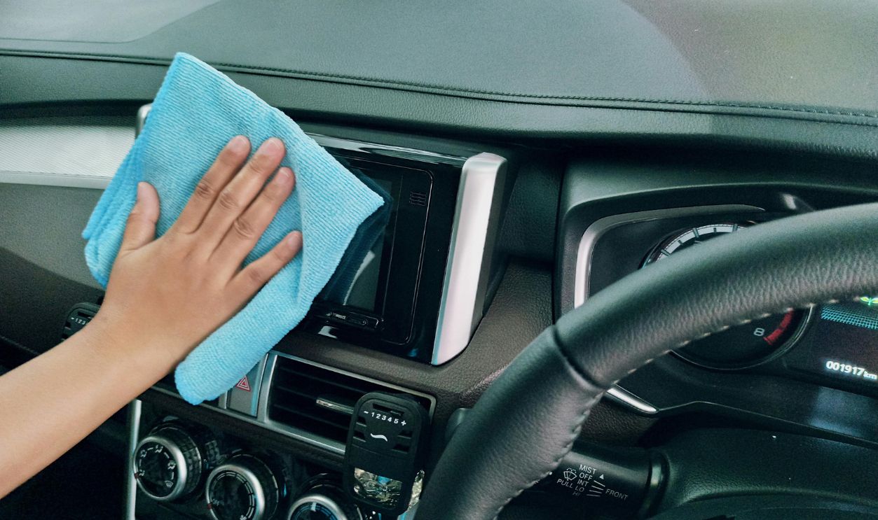 Cleaning car dashboard