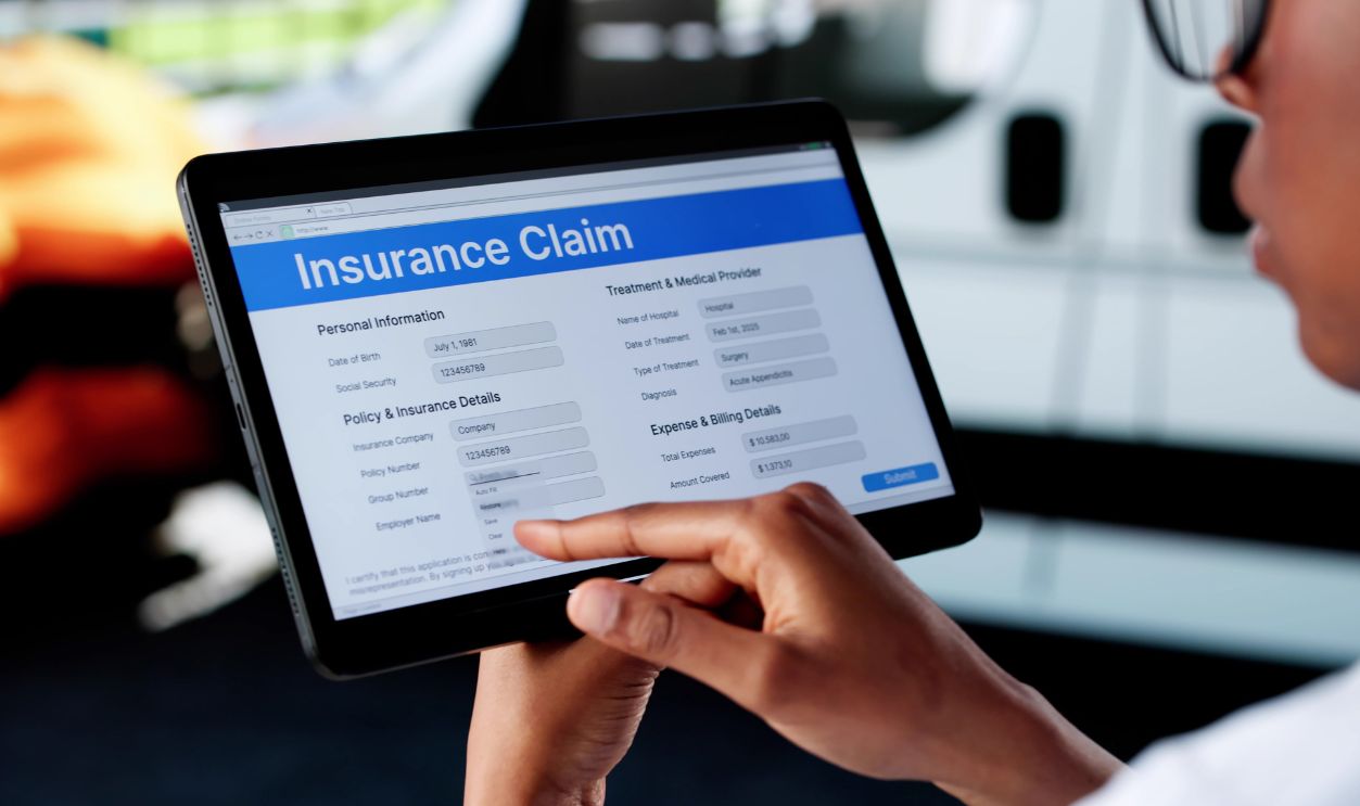 Black Woman Inspecting Car Damage For Insurance Claim On Tablet