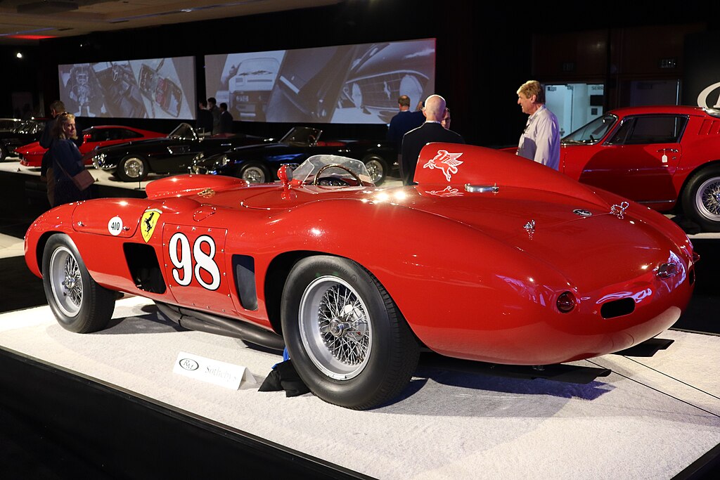 A close-up photo of a 1955 Ferrari 410 Sport car on display at an exhibition