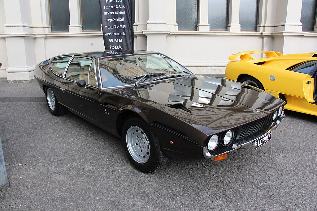 A close-up photo of a Lamborghini Espada car on display at an exhibition