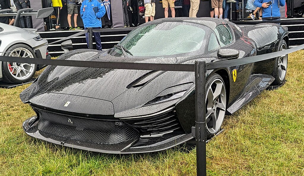 A close-up photo of a Ferrari Daytona SP3 car on display at an exhibition