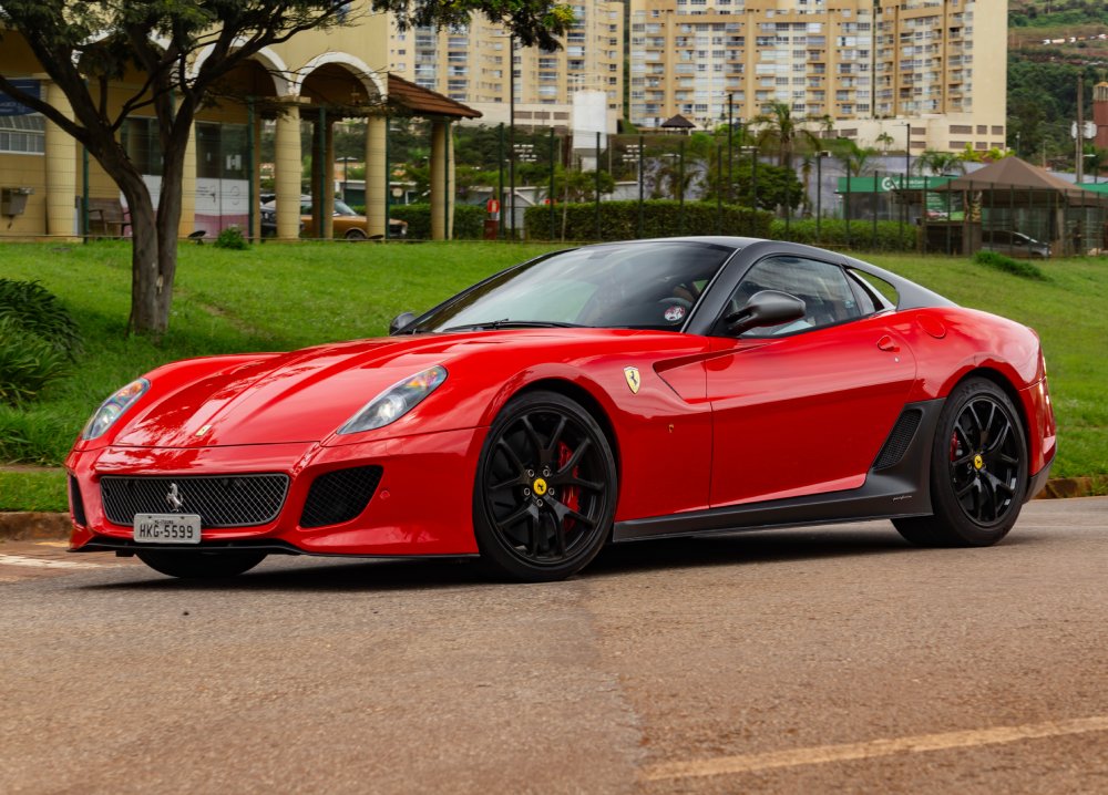 A close-up photo of a Ferrari 599 GTO car on display at an exhibition