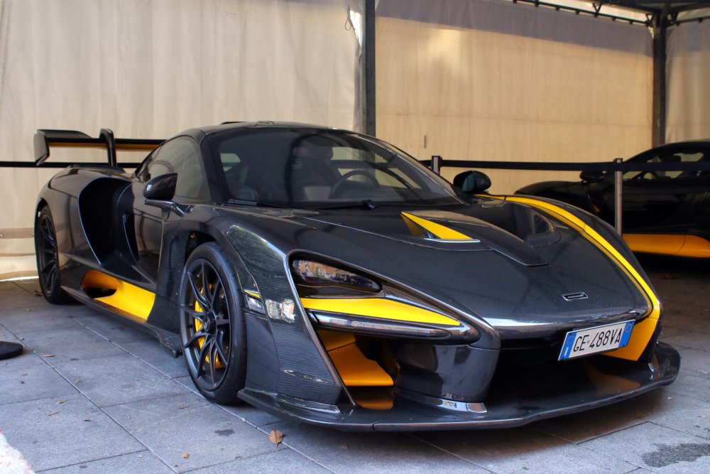 A close-up photo of a McLaren Senna car on display at an exhibition