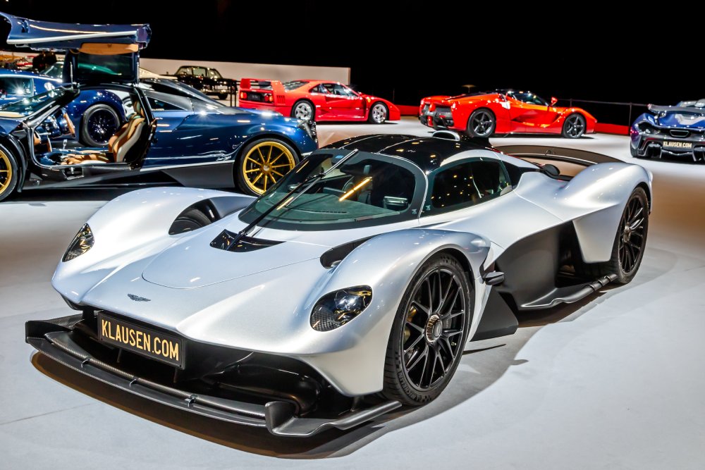 A close-up photo of a Aston Martin Valkyrie car on display at an exhibition