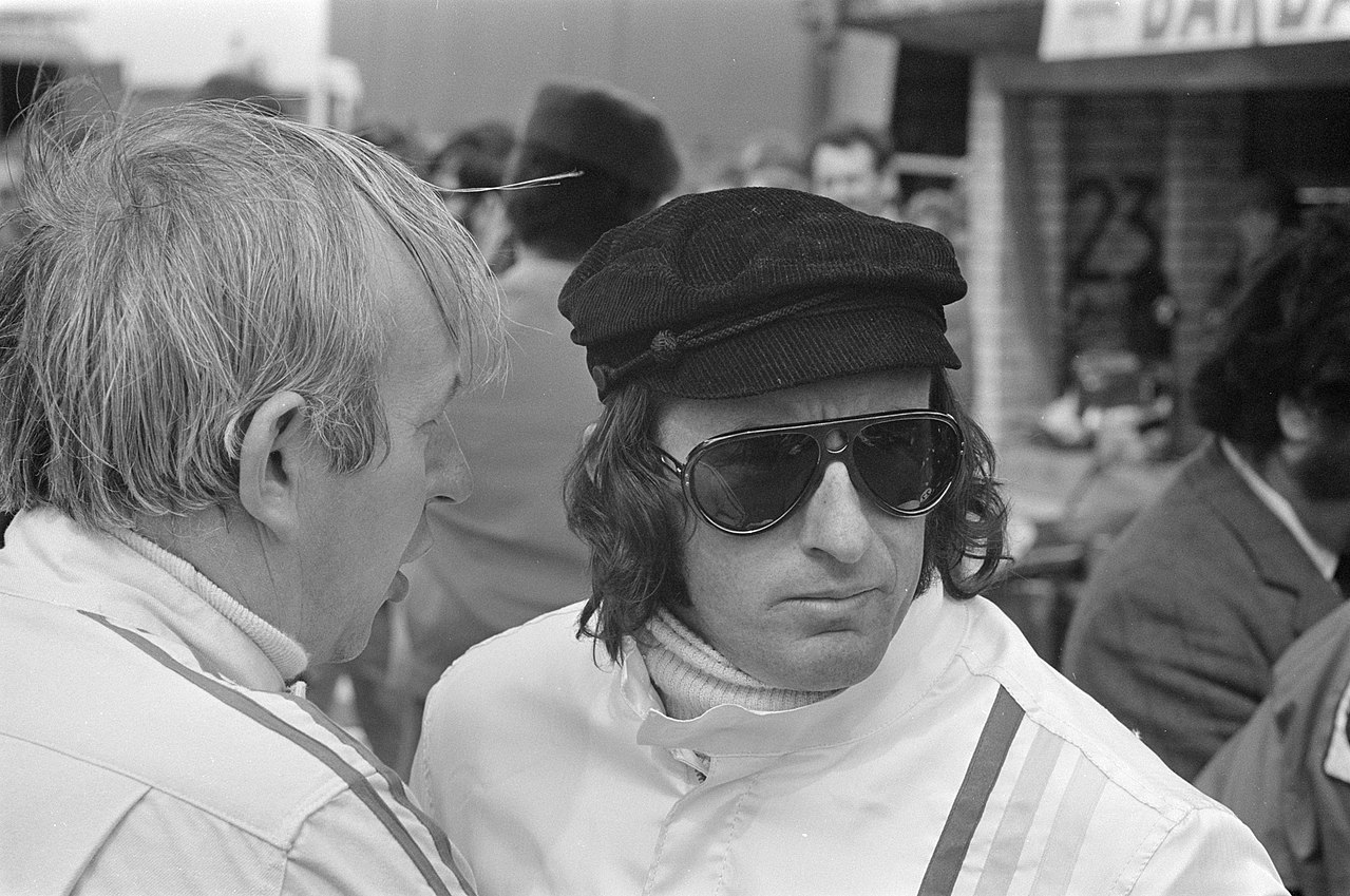 Jackie Stewart wearing a pair of sunglasses