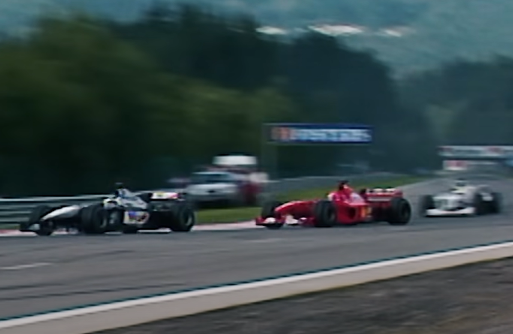 Screenshot of Michael Schumacher and Mika Hakkinen from - FORMULA 1, All The Angles - 2000 Belgian Grand Prix