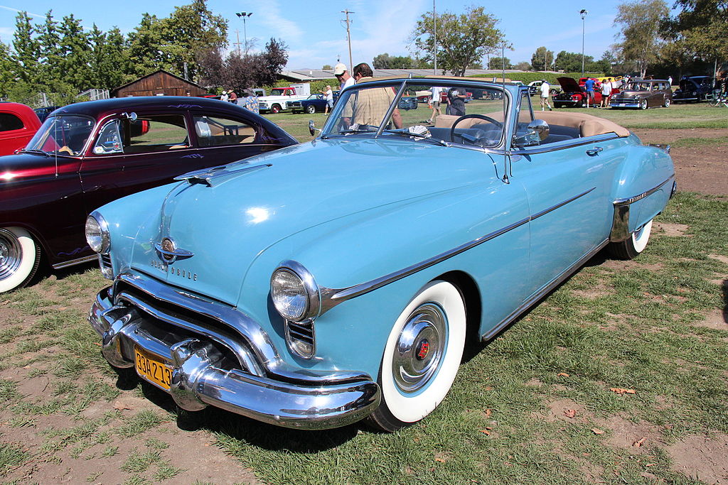 A close-up photo of a Oldsmobile 98 car on display at an exhibition