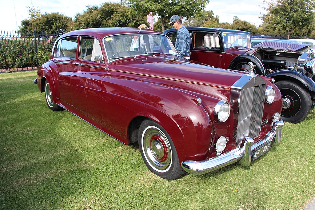 A close-up photo of a Rolls Royce Silver Cloud car on display at an exhibition