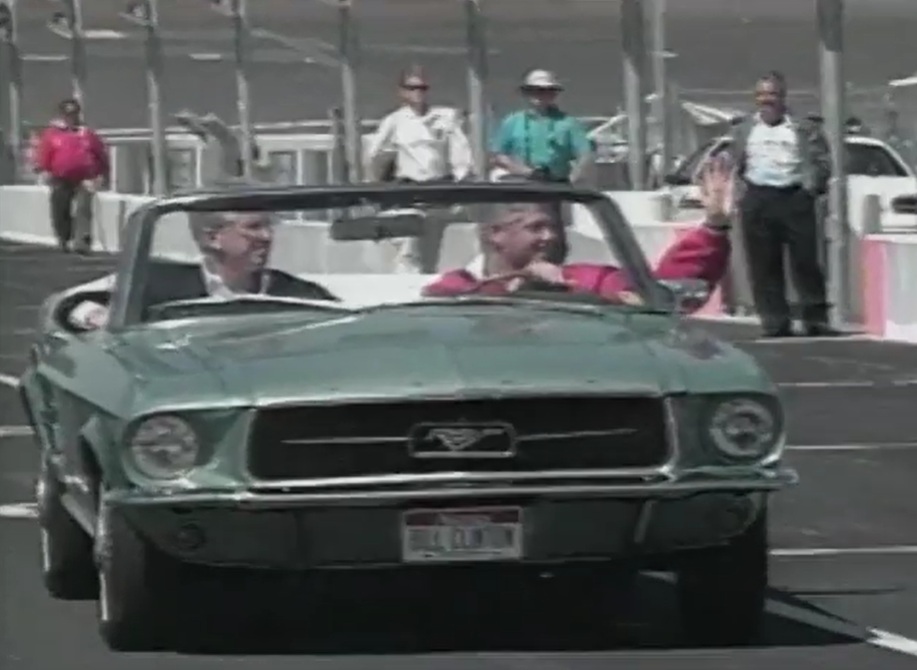 Screenshot of President Bill Clinton driving 1967 Mustang Convertible