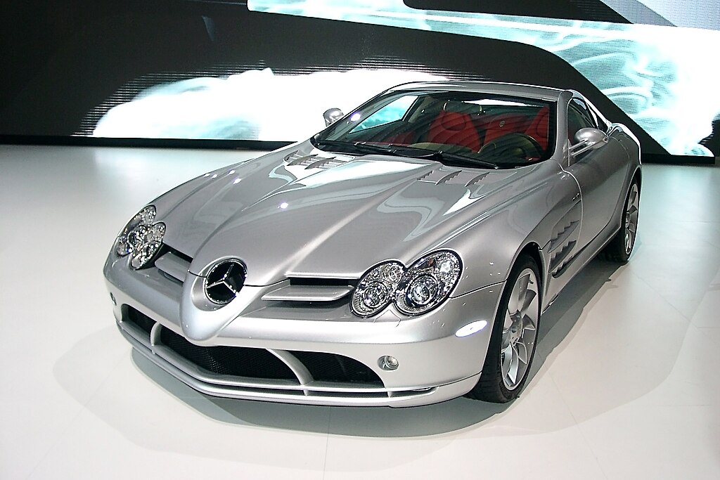 A close-up photo of a SLR McLaren-Mercedes car on display at an exhibition