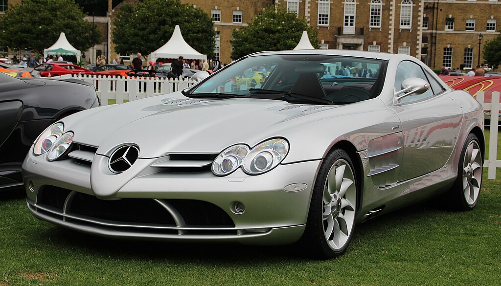 A close-up photo of a Mercedes-Benz SLR McLaren car on display at an exhibition
